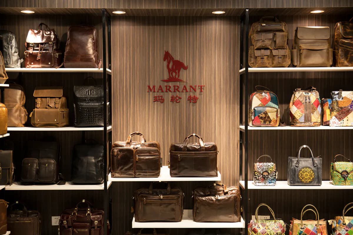 Marrant showroom displaying leather bags and small leather goods