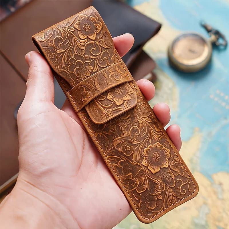 Style Q1010 floral-embossed top-grain leather pen sleeve feature overview; pens not included